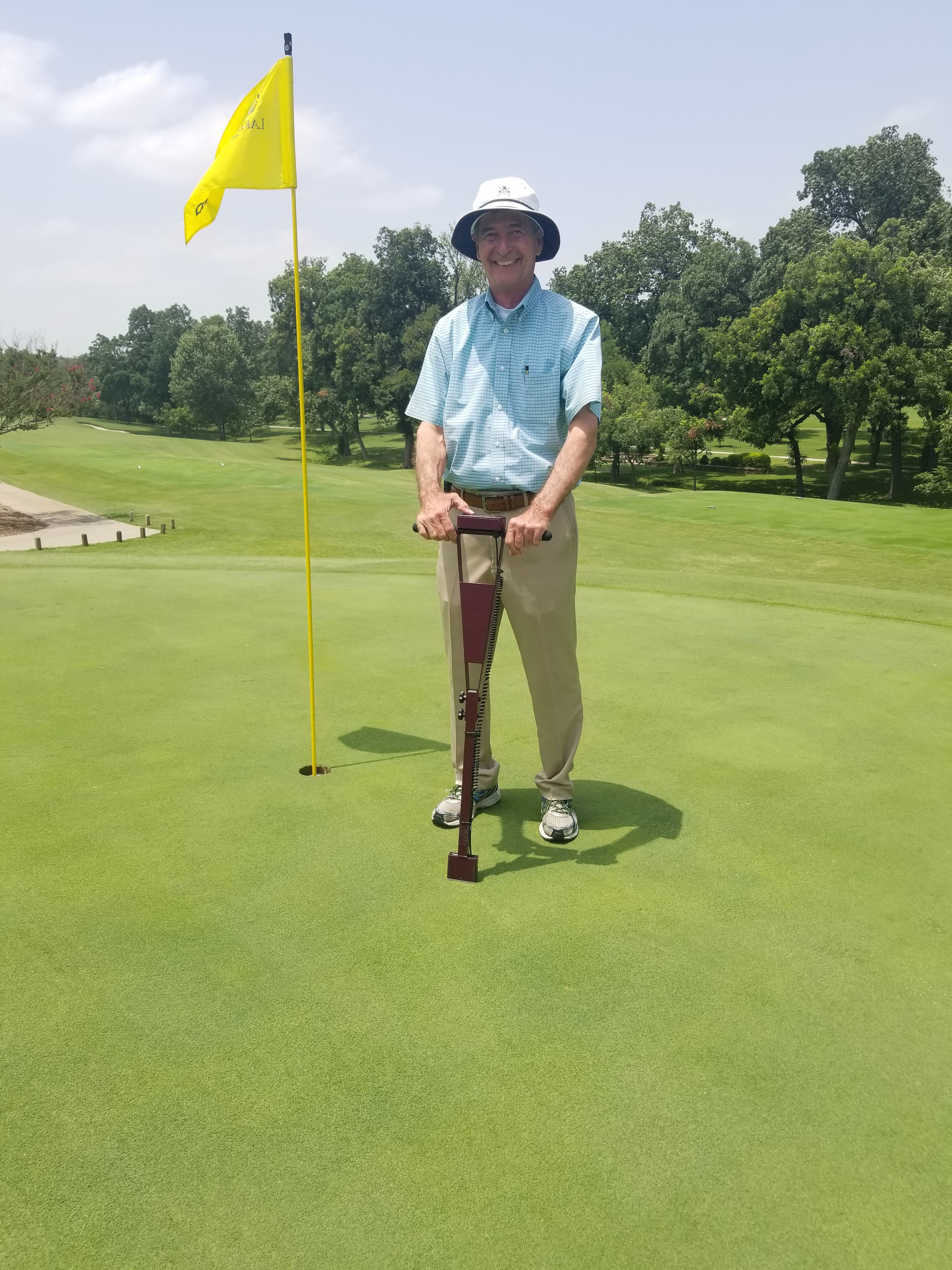 Picture of Mike Plummer with a Moisture Meter